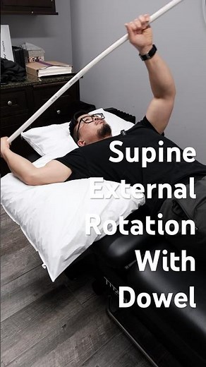 Supine Shoulder External Rotation With Dowel