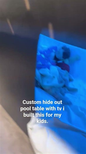 Custom poolTable with pool table and kitchen. Modern kitchen table tv secret hideout