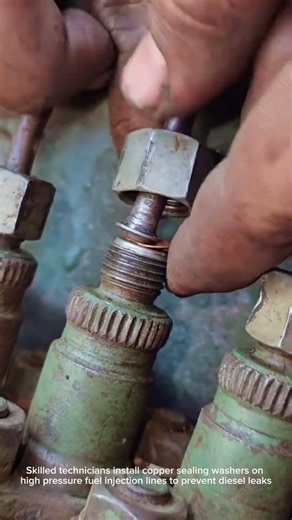 Diesel Mechanics Repairing Fuel Injection Pumps On Engines Manually