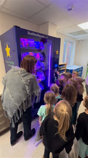 First time using the book vending machine | Fulton Pirate Preschool
