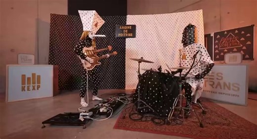 Band: Angine de PoitrineSong: Sarniezz (live KEXP performance)Quebec’s masked microtonal math-rock duo in giant papier-mâché heads serving pure circus-sideshow chaos with double-neck guitars and Primus-level weirdness. The kids really ARE gonna be alright 🔥New album Vol. II drops TOMORROW — April 3, 2026!