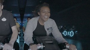 Buckle up and join Janai Norman for an epic ride on Disney’s new TRON coaster