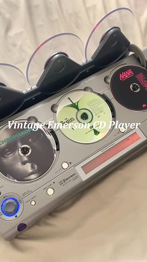 Rediscover the joy of physical music! 🎵 This vintage CD player fills your room with warm, crystal-clear, skip-free sound for hours. 💿Watch discs rotate in the mesmerizing glow - a moving piece of art that creates the perfect cozy vibe for relaxing or hosting friends. Pure nostalgia meets modern precision! 💽✨ | Erin Staudt Ryan