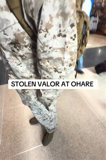 The Marine who called this guy out was right to do so. Active-duty Marines are not authorized to wear the utility uniform (cammies) while traveling through commercial airports as passengers. Per MCO 1020.34H and ALMAR 035/07, cammies are a working uniform, not a liberty or travel uniform. They are only authorized for direct commuting to and from work in a vehicle, with very limited drive-thru exceptions where you do not exit the vehicle. Walking through an airport terminal in full cammies is not