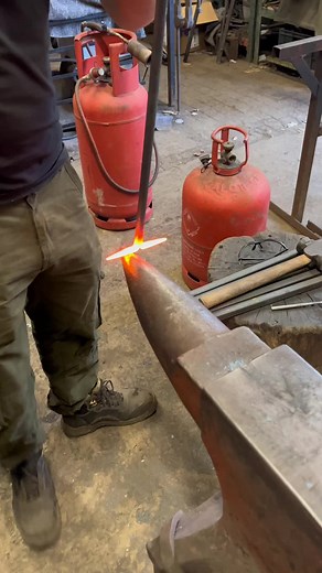 Forging the ends of a set of Wrap Tongs. #tomfellblacksmith #blacksmith #blacksmithing #fire #firetools #handmade #handcrafted #fireplace #homeinspo