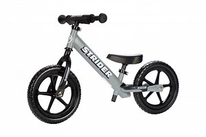 Strider 12” Sport Bike, Matte Gray - No Pedal Balance Bicycle for Kids 1 to 4 Years - Includes Safety Pad, Padded Seat, Mini Grips & Flat-Free Tires - Tool-Free Assembly & Adjustments