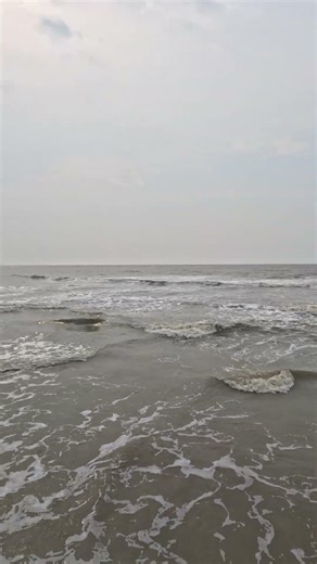 High Tide water rushing in at the Tajpur Beach