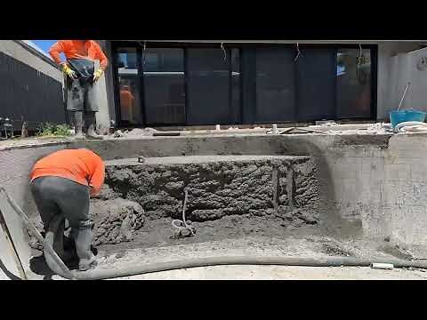 Adding new concrete steps to a swimming pool.
