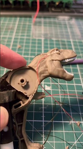 Small Arduino projects, smoking dinosaur, wobbling its head and blinking its eyes