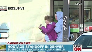 See police take out man holding hostage