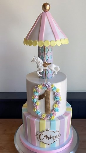Adorable carousel cake, perfect for a princess! | The SweetSide | Facebook