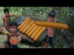 Primitive Technology KH - Eating delicious - Recipe Cooking hot dogs on a rock