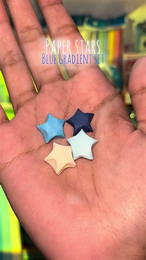 Blue stars folded carefully, like soft pieces of hope. 💙⭐️ #papercraft #paperstars #DIYcrafts #craftingfun #origami