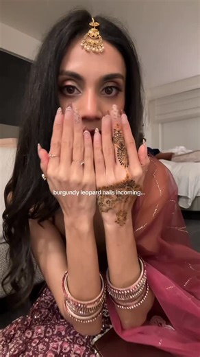 aarti on Instagram: "it’s 1am, had to post cuz im fr obsessed w my nails, they’re SO CUTE & IM SO HAPPY!! they only took me 12 hours to do 😭 no fr, i stayed up till 6am lol but they match my cherry notebook and my lehenga ;) 🍒 🐆 i’ll post the full diy nail vid sooooon