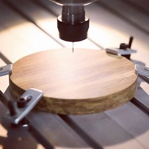 2.6K views · 37 reactions | Our high precision CNC router carving the logo into a piece of HD Bamboo. All the iBox speakers have this logo in the back panel. In realtime it takes about 12 minutes to get the smoothest edges you will ever see. Visit the webstore for more Thodio craftsmanship: https://store.thodio.com | Thodio | Facebook