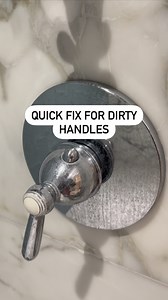 If your chrome shower fixtures look similar to this, let me show you an easy way to fix it. You only need two things. After you wet your water handle, pour some Bar Keepers Friend on a clean, thick microfiber towel and start wiping the handle. You’ll begin to notice that the build-up will easily lift off. If some of the buildup still remains on the water handle, add more bar keepers friend to your towel and wipe again. Once you are done cleaning, spray some water and then wipe the handle again. 
