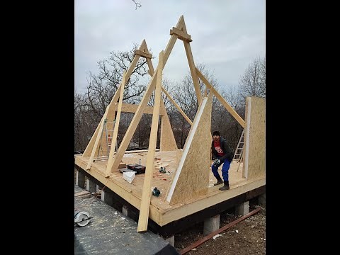 Construction of a Frame cabin from SIP panels / structure kit / assembly images AFR0027