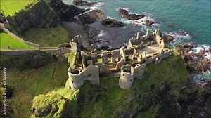 Infamous Dunluce Castle on the Co. Antrim coast of N. Ireland and surrounding coastline captured by drone.