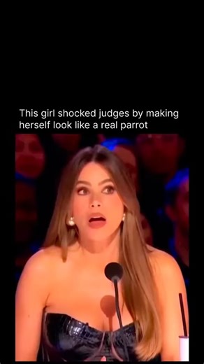 curiosity AI on Instagram: "This moment happened on America's Got Talent during the audition rounds, when a female performer stunned the judges by transforming herself into what looked like a real, living parrot right on stage. At first, the camera cut to the judges including Sofia Vergara and Simon Cowell who were clearly intrigued but unsure of what they were watching. Within seconds, the illusion clicked, and the reveal left the panel visibly shocked as the audience erupted."