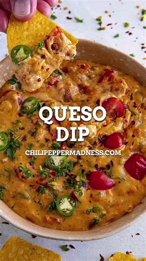 This homemade queso dip recipe is the perfect gooey cheese dip and so easy to make with lots of melted cheese, jalapenos, tomatoes and spices. Don't forget the chips! For a full list of ingredients and step-by-step instructions, google “queso dip chili pepper madness”. Use hashtag #chilipeppermadness if you make this recipe! RECIPE: https://www.chilipeppermadness.com/recipes/queso-dip/ #quesodip #cheesedip #queso #mexicanrecipe #mexicanrecipes #diprecipe #mexicanfood #dip #spicy #spicyfood #spic