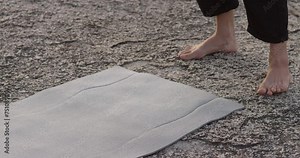 Yoga mat spread on ground meditation practice close-up Yoga mat symbol healthy lifestyle. Yoga mat preparing mind and body for tranquility First step in journey towards inner peace and balance.