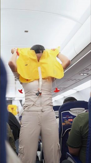 POV: Using an emergency life vest on airplane
