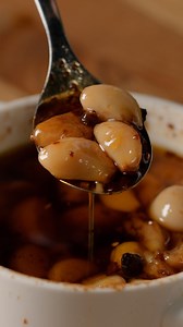 garlic hack for all the garlic girlies: confit in chili oil for an unexpected kick! ?️ For inspo on how to use garlic confit, head to the recipe here! https://tasty.co/recipe/cheesy-50-garlic-clove-pull-apart-bread | Tasty