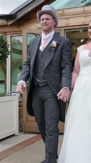 bride and groom walk up the aisle