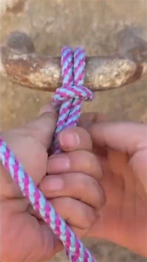 a person is tying the rope properly and correctly