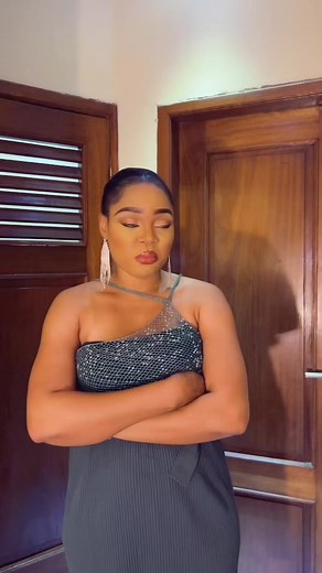 Elegant Indoor Fashion Display Featuring Sequined Dress