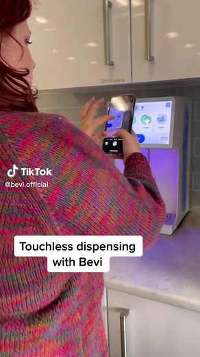 It’s like magic. 🪄To use touchless dispensing with your Bevi machine: 1. Scan the QR code on the Bevi touchscreen with your phone’s QR reader app. 2. Dispense your drink as you would using the Bevi touchscreen. 3. Grab your beverage and enjoy! 💙 #touchlessdispenser #bevi #water #officetok #corporatetok #seltzerwater #watergoals #hydrationcheck