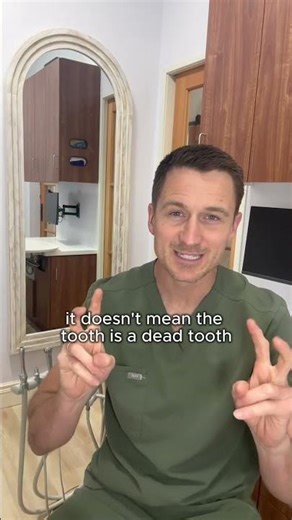 If your child has dark tooth, don't pull it out yet, here's why...