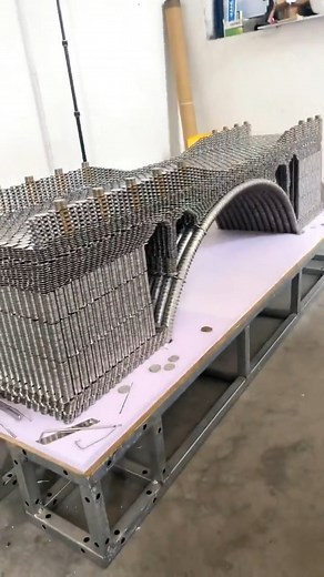 16 reactions | Coin Bridge: Where Currency Meets Creativity! 勞✨ Behold the incredible fusion of art and currency as countless coins come together to build a stunning bridge. Each coin tells a story, and together they form a testament to human ingenuity and imagination.  #CoinBridge #ArtisticWonders #CurrencyCreativity | News View | Facebook