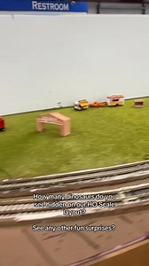 How many dinosaurs do you spy on our HO Scale layout? Do you see any other hidden treasures? #modeltrains | Midwest Model Railroad