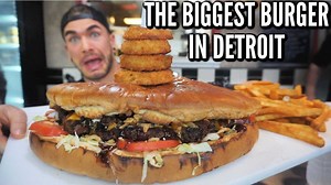 200K views · 5.8K reactions | The biggest burger north of Detroit Michigan is at Burger Shack in Dearborn Michigan! This giant burger offers over 3lb of beef, the biggest brioche bun, bbq brisket, veggies, sauces and so much more (not to mention the side of fries). With only a 30 minute time limit can we defeat this undefeated food challenge or will this giant burger crush us? | Joel Hansen - Model Vs Food | Facebook