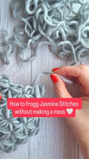 Starting over is SUPER important when learning the Jasmine Stitch! But – frogging jasmine stitches can be a bit of a pain, especially if you are working with fuzzy yarn. This one simple trick makes it sooo much easier! BEFORE pulling the yarn to frog: Gently open the single crochet that secures the loops of the petals – and then spread the loops out. Then pull, carefully. Do this, and you will be frogging fluffy yarn Jasmine Stitches like a pro! Try it out – it will save you lots of time (and ta