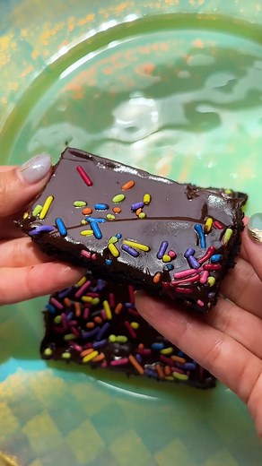 Nostalgia is a powerful feeling! Cosmic brownies were always a family favorite growing up. This recipe makes it suuuper easy to time travel to a simpler time ... or just to bring a last-minute contribution to the picnic. Get the recipe and bake it easy: BakeWith.Us/EasyFrostedBrownies | King Arthur Baking Company