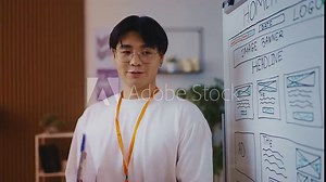 Professional IT school teacher teaching a web design course, explaining material