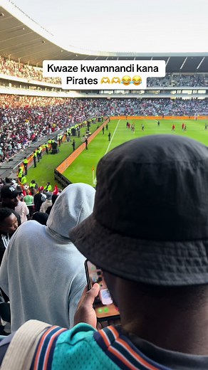 Exciting Stadium Atmosphere with Diverse Crowd Cheers