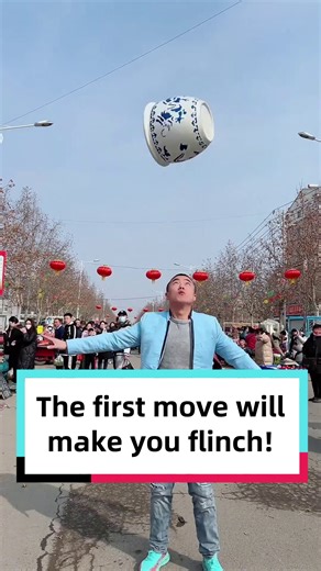 A massive, heavy jar was hurled into the air and caught on the acrobat's head. The opening move of this act alone was enough to make hearts skip a beat. Did it catch you off guard? | Discover China