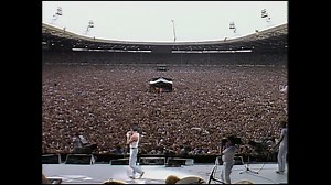 👑 Queen 1985 : Live Aid “I remember looking up and seeing the whole place going completely bonkers in unison and thinking ’oh, this is going well.’” Roger Taylor On the 13th July, 1985, a host of music stars came together for Live Aid; a concert to raise awareness and money for the famine in Ethiopia. It inspired Queen’s finest 20 minutes! Watch Episode 30 now ⬇️ http://queen.lnk.to/TheGreatest 🎥 #QueenTheGreatest | Queen