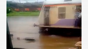 WATCH | Did Mumbai's Local Train Turn Into A Water Ride? Internet Reacts To Viral Video!