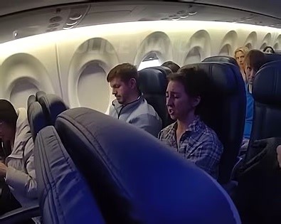 Moment drunk passenger hauled off flight after ENTIRE plane forced to disembark
