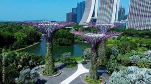 Aerial drone landscape of Supertree grove vertical Gardens by the Bay Marina bay Sands Singapore city Dragonfly lake Asia travel holidays