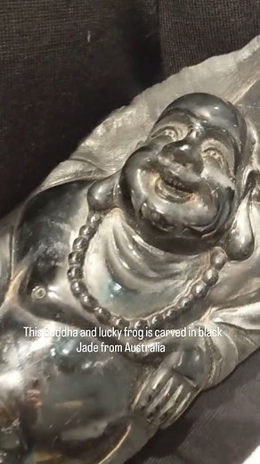 15 reactions | Black jade Buddha  carved in Australian solid black jade. This lively sculpture incorporates many of the lucky symbols in Chinese culture including a mythical fortune frog, Happy Buddha, money sack and coins. The back of this piece is left entirely natural and shows the capstone of the boulder with it's curiously angular edges Please DM for details . #blackjade #buddha #carvingofig #altarart | Crystalworks Gallery | Facebook