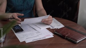 QR Code Scanner Paying. Electricity and Gas Bill. Payment of utility using QR code and mobile device. Housewife online pays with smartphone at home