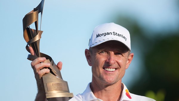 FedEx COO Richard Smith presents Justin Rose with FedEx St. Jude Championship trophy