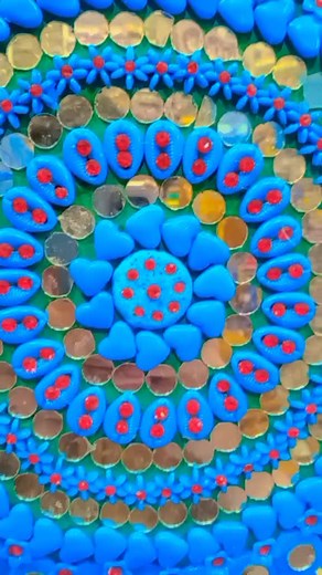 Stunning Blue Beaded Artwork with Red and Gold Accents