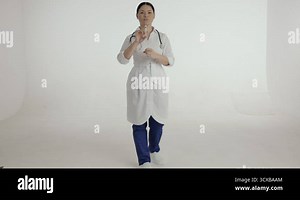 Asian female nurse in white medical unifrom Stock Video Footage - Alamy