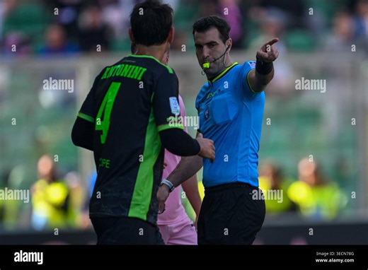 The referee Claudio Giuseppe Allegretta checks after the V.A.R. (Video Assistant Referee) assigtn freekick during the Italian Serie BKT match between Palermo F.C. vs U.S. Catanzaro 1929, 1st May 2026 at the Renzo Barbera stadium in Palermo, Italy Stock Photo - Alamy